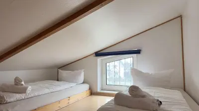 Ein Bett oder Betten in einem Zimmer der Unterkunft Schilingshof WHG 3