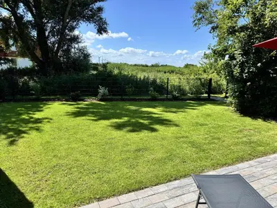 Ein Garten an der Unterkunft Ferienhaus Nordlicht
