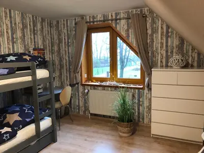 Ein Bett oder Betten in einem Zimmer der Unterkunft Ferienwohnung Kalle