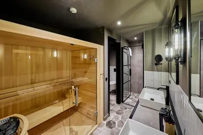 Ein Badezimmer in der Unterkunft River Loft Hotel