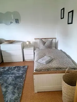 Ein Bett oder Betten in einem Zimmer der Unterkunft Ferienhaus Sophie