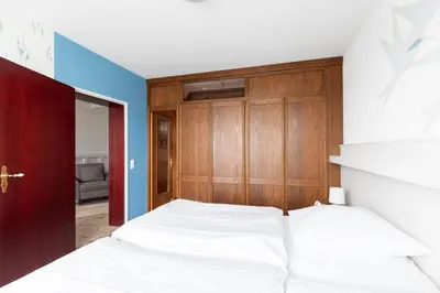 Ein Bett oder Betten in einem Zimmer der Unterkunft Haus Rotesand, Whg 127