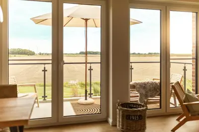 Ein Balkon oder eine Terrasse in der Unterkunft Nordseehof Brömmer Deichhus