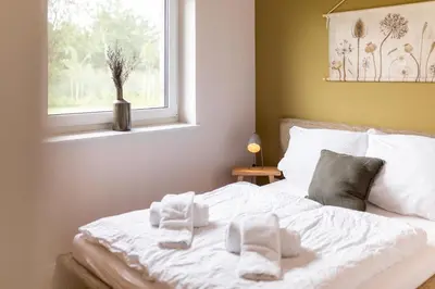 Ein Bett oder Betten in einem Zimmer der Unterkunft Nordseehof Brömmer Wattenhus