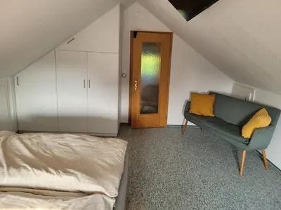Ein Sitzbereich in der Unterkunft Ferienhaus Frieda