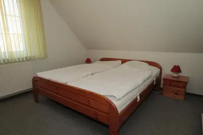 Ein Bett oder Betten in einem Zimmer der Unterkunft Ferienhaus Seehund - strandnah - All Inklusive