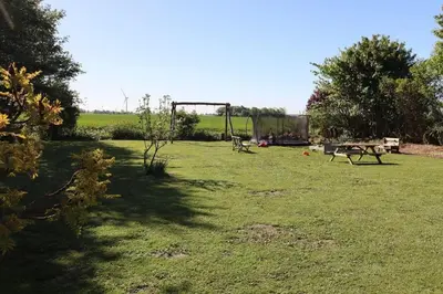 Ein Garten an der Unterkunft Fewo-Nordseebaer