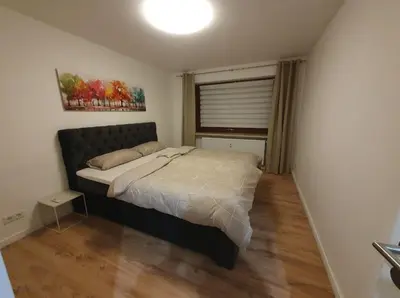 Ein Bett oder Betten in einem Zimmer der Unterkunft Ferienwohnung in einer idyllischen Lage