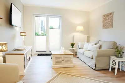 Ein Sitzbereich in der Unterkunft Dat-Meerhus Wohnung 3