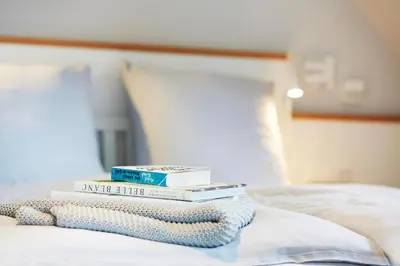 Ein Bett oder Betten in einem Zimmer der Unterkunft Dat-Meerhus Wohnung 4