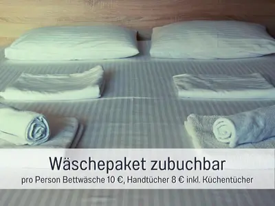 Ein Bett oder Betten in einem Zimmer der Unterkunft Ferienhaus Odisheim - Hunde herzlich willkommen - hoher Zaun - Terrasse mit Überdachung - familienfreundlich