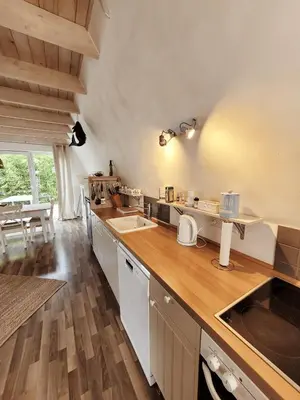 Küche/Küchenzeile in der Unterkunft Ferienhaus ROSA mit Sauna
