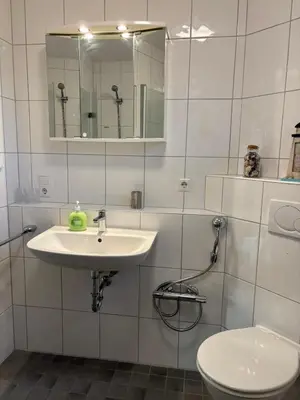 Ein Badezimmer in der Unterkunft Duhner Leuchturm, Ferienwohnung DL02