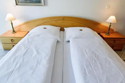 Ein Bett oder Betten in einem Zimmer der Unterkunft Haus Nordseebrandung ND62