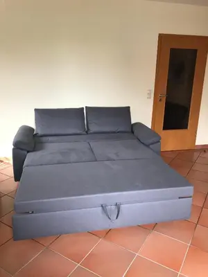 Ein Sitzbereich in der Unterkunft Ferienwohnung Kuhlmann Wurster Nordseeküste
