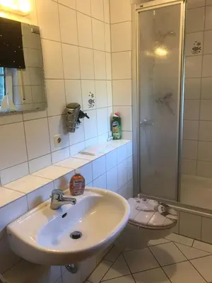 Ein Badezimmer in der Unterkunft Ferienwohnung Kuhlmann Wurster Nordseeküste