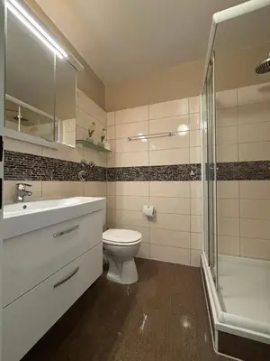 Ein Badezimmer in der Unterkunft Haus Poseidon, Ferienwohnung POS36