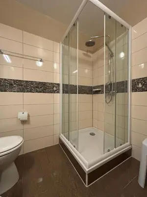 Ein Badezimmer in der Unterkunft Haus Poseidon, Ferienwohnung POS36