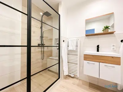 Ein Badezimmer in der Unterkunft Haus Jan am Strand Wohnung 204