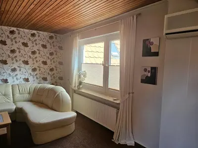 Ein Sitzbereich in der Unterkunft Ferienwohnung Alt Otterndorf