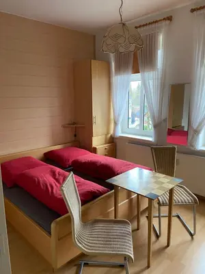 Ein Bett oder Betten in einem Zimmer der Unterkunft Kleine Stranddüne