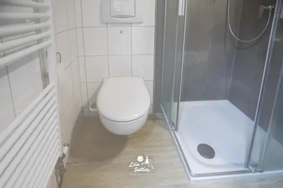 Ein Badezimmer in der Unterkunft 