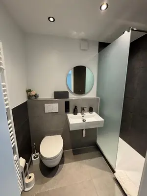Ein Badezimmer in der Unterkunft Atlantic 003- Exclusive Ferienwohnung mit Pool, Sauna und Fitnessbereich im Haus