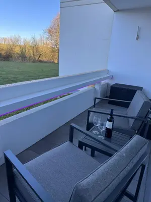 Ein Sitzbereich in der Unterkunft Atlantic 003- Exclusive Ferienwohnung mit Pool, Sauna und Fitnessbereich im Haus