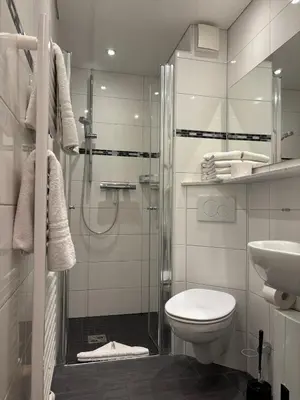 Ein Badezimmer in der Unterkunft Haus Pavillon, Ferienwohnung 13