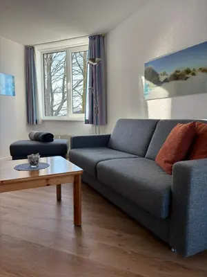 Ein Sitzbereich in der Unterkunft Haus Hohe Worth, Apartment 112