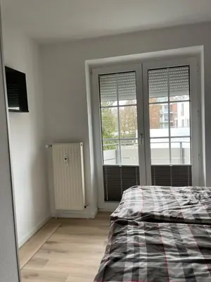 Ein Bett oder Betten in einem Zimmer der Unterkunft Steinmarne Wohnung 6