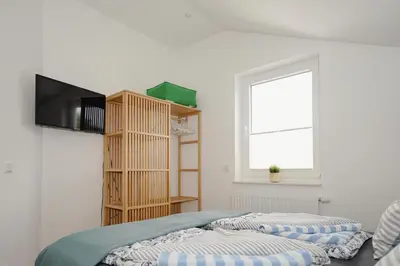 Ein Bett oder Betten in einem Zimmer der Unterkunft Nordseeliebe