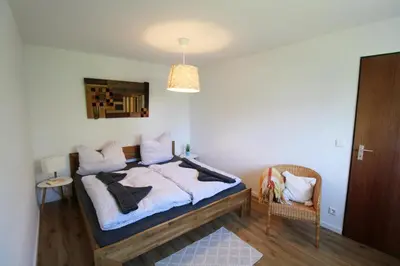 Ein Bett oder Betten in einem Zimmer der Unterkunft Watt´n Diek