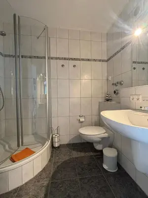 Ein Badezimmer in der Unterkunft Haus Poseidon, Ferienwohnung POS29