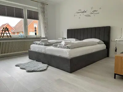 Ein Bett oder Betten in einem Zimmer der Unterkunft Strandrevier No4