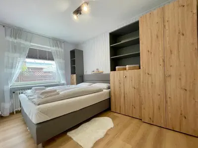 Ein Bett oder Betten in einem Zimmer der Unterkunft Wattrevier No4