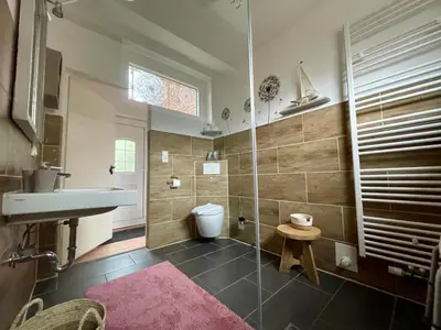 Ein Badezimmer in der Unterkunft Wattrevier No4