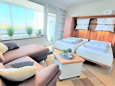 Ein Bett oder Betten in einem Zimmer der Unterkunft Residenz Atlantic - Ferien-Apartments