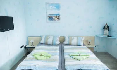 Ein Bett oder Betten in einem Zimmer der Unterkunft Haus Meereswoge
