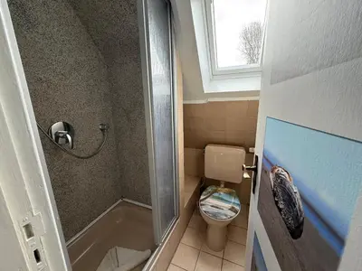 Ein Badezimmer in der Unterkunft Haus Meereswoge
