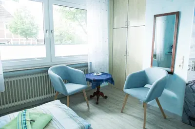 Ein Sitzbereich in der Unterkunft Haus Meereswoge