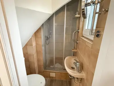 Ein Badezimmer in der Unterkunft Haus Meereswoge