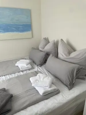 Ein Bett oder Betten in einem Zimmer der Unterkunft Ferienwohnung Steubenhöft