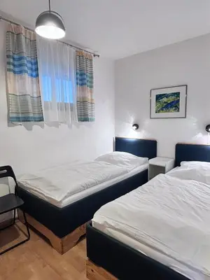 Ein Bett oder Betten in einem Zimmer der Unterkunft Haus Poseidon, Apartment POS07