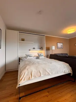 Ein Bett oder Betten in einem Zimmer der Unterkunft Haus Poseidon, Ferienwohnung POS33