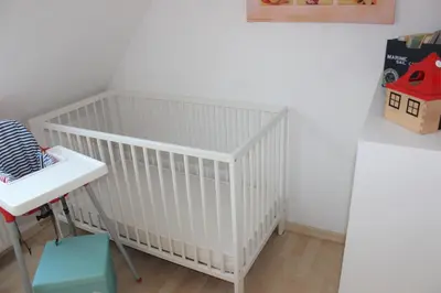 Ein Bett oder Betten in einem Zimmer der Unterkunft Ferienhaus Alter Duhner Weg