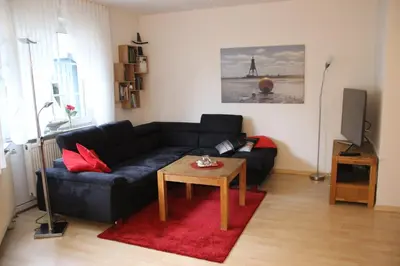 Ein Sitzbereich in der Unterkunft Ferienhaus Alter Duhner Weg