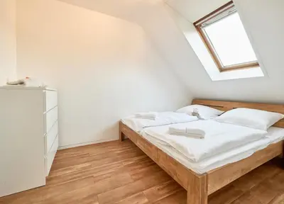 Ein Bett oder Betten in einem Zimmer der Unterkunft Dallacker 13 - Dachgeschoss