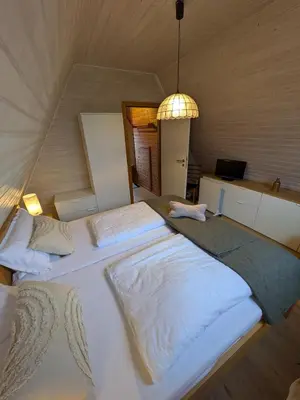 Ein Bett oder Betten in einem Zimmer der Unterkunft Haus am Meer
