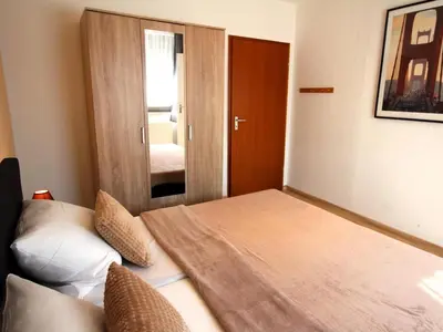 Ein Bett oder Betten in einem Zimmer der Unterkunft Haus Vogelsand